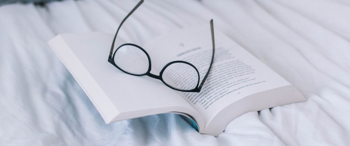 open book and glasses